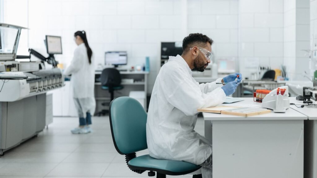 Researchers working with samples in a modern analytical laboratory
