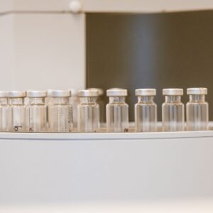 Close-up of empty glass vials in a laboratory
